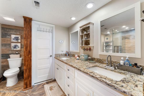 Bathroom, Dual Sink Vanities, Interior, Recessed Lighting, Wood Texture Flooring