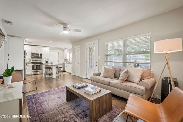 Dining room, Interior, Kitchen, Living room, Recessed Lighting, Stainless Steel Appliances, Wood Texture Flooring