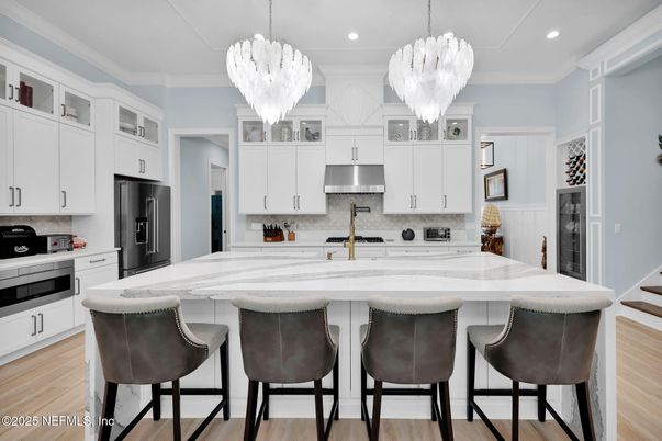 Chandelier, Interior, Kitchen, Pendant Lights, Recessed Lighting, Stainless Steel Appliances, Wood Texture Flooring