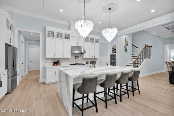 Chandelier, Interior, Kitchen, Pendant Lights, Recessed Lighting, Stainless Steel Appliances, Wood Texture Flooring