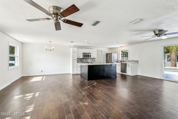 Chandelier, Interior, Kitchen, Recessed Lighting, Stainless Steel Appliances, Wood Texture Flooring