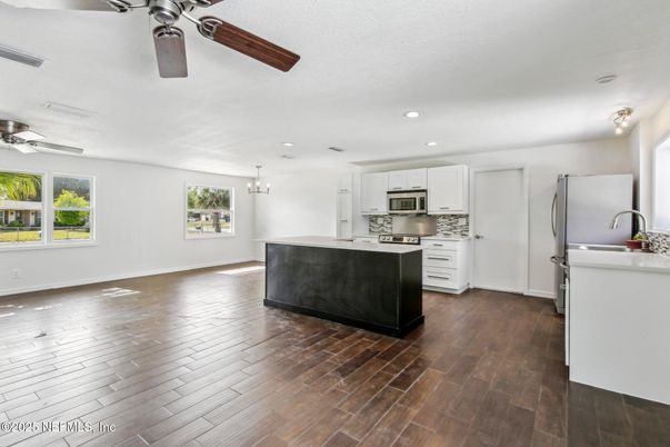 Interior, Kitchen, Pendant Lights, Recessed Lighting, Stainless Steel Appliances, Wood Texture Flooring