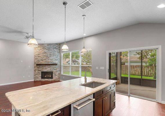 Fireplace, Interior, Kitchen, Pendant Lights, Recessed Lighting, Stone Walls, Wood Texture Flooring