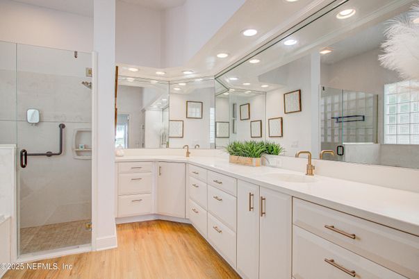 Bathroom, Dual Sink Vanities, Glass Shower, Interior, Recessed Lighting, Wood Texture Flooring