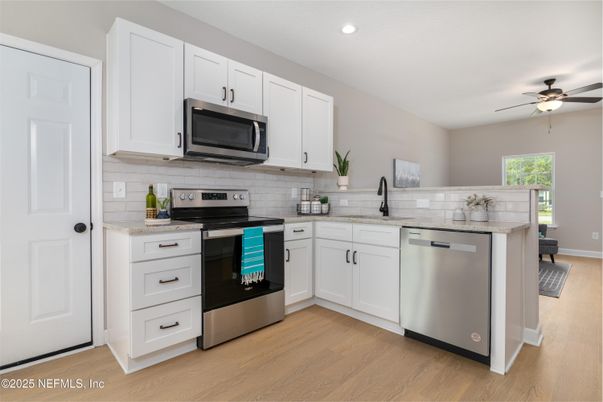 Interior, Kitchen, Recessed Lighting, Stainless Steel Appliances, Wood Texture Flooring