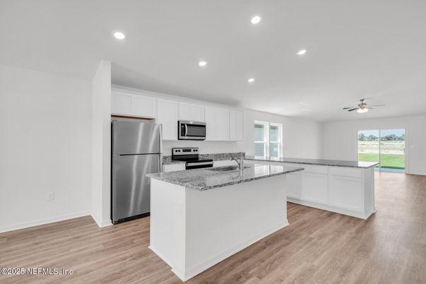 Interior, Kitchen, Recessed Lighting, Stainless Steel Appliances, Wood Texture Flooring