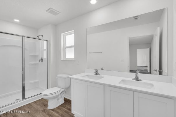 Bathroom, Dual Sink Vanities, Glass Shower, Interior, Recessed Lighting, Wood Texture Flooring