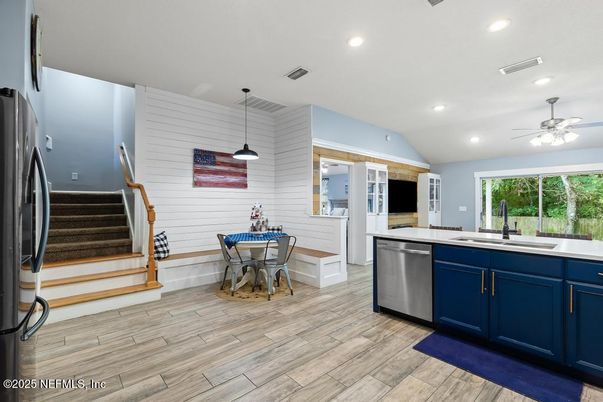 Dining room, Interior, Kitchen, Pendant Lights, Recessed Lighting, Stainless Steel Appliances, Wood Texture Flooring