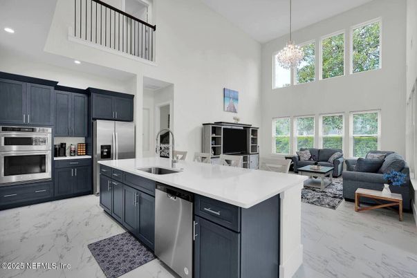 Chandelier, Interior, Kitchen, Living room, Marble, Pendant Lights, Recessed Lighting, Stainless Steel Appliances