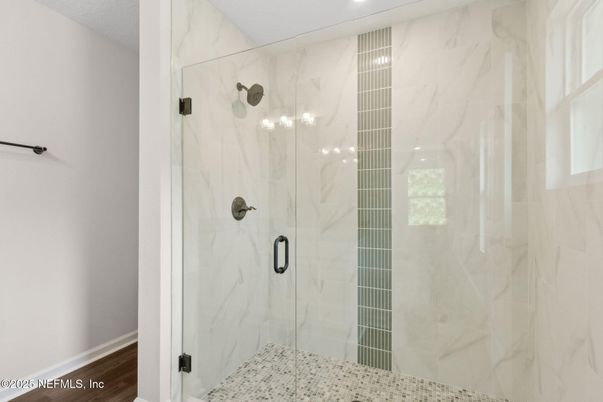 Bathroom, Glass Shower, Interior, Marble Walls, Recessed Lighting, Wood Texture Flooring