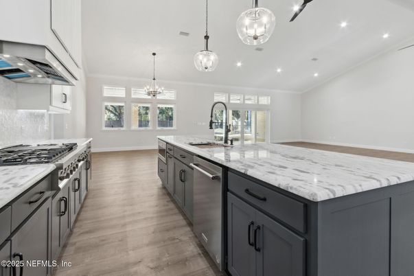 Chandelier, Interior, Kitchen, Pendant Lights, Recessed Lighting, Stainless Steel Appliances, Wood Texture Flooring
