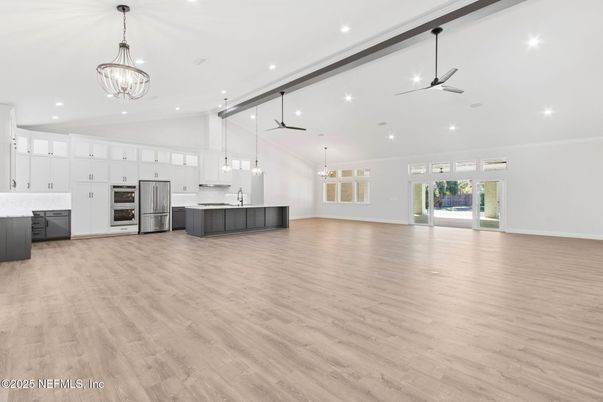 Chandelier, Interior, Kitchen, Pendant Lights, Recessed Lighting, Stainless Steel Appliances, Wood Texture Flooring