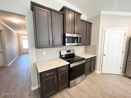 Interior, Kitchen, Pendant Lights, Stainless Steel Appliances, Wood Texture Flooring