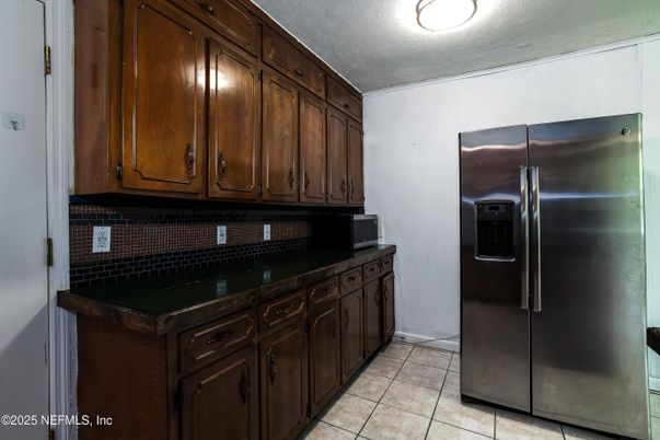 Interior, Kitchen, Stainless Steel Appliances, Tile Countertops