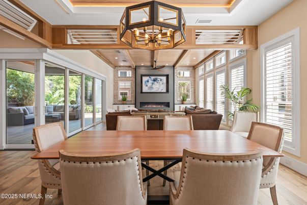 Chandelier, Dining room, Fireplace, Interior, Living room, Recessed Lighting, Wood Texture Flooring
