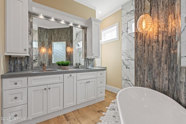 Bathroom, Dual Sink Vanities, Free Standing Baths, Interior, Marble Walls, Recessed Lighting, Wood Texture Flooring