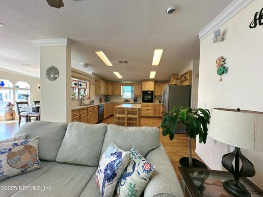 Dining room, Interior, Kitchen, Living room, Recessed Lighting, Stainless Steel Appliances, Wood Texture Flooring