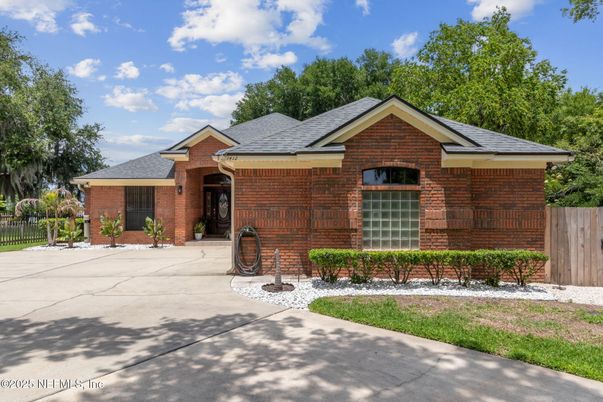Exterior, Facade, Brick Facade, Log Home