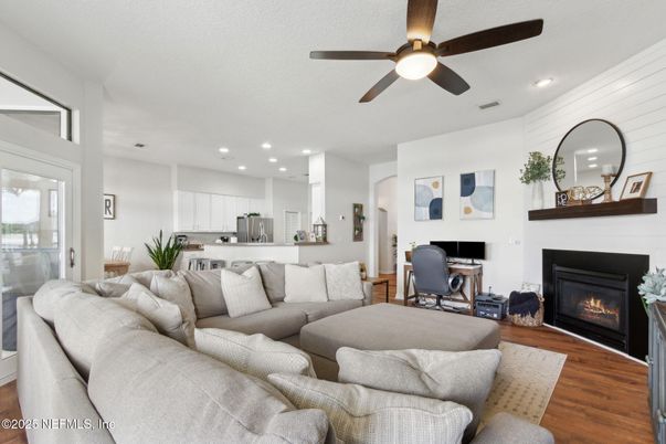 Fireplace, Interior, Kitchen, Living room, Recessed Lighting, Wood Texture Flooring