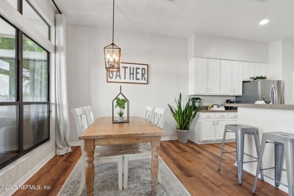 Dining room, Interior, Kitchen, Pendant Lights, Recessed Lighting, Stainless Steel Appliances, Wood Texture Flooring