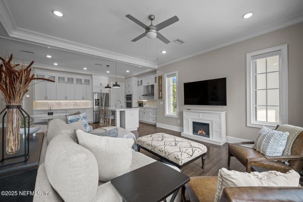 Fireplace, Interior, Kitchen, Living room, Pendant Lights, Recessed Lighting, Stainless Steel Appliances, Wood Texture Flooring