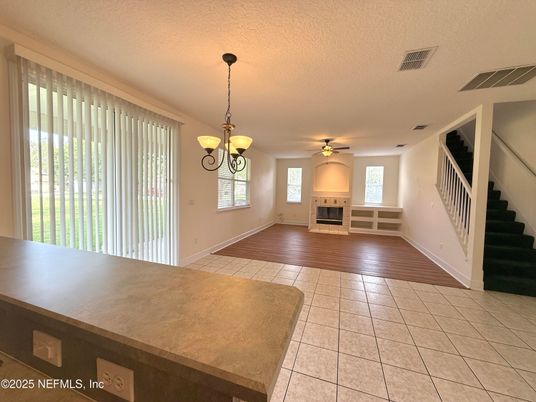 Chandelier, Empty room, Fireplace, Interior, Pendant Lights, Wood Texture Flooring