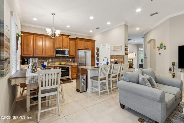 Chandelier, Dining room, Interior, Kitchen, Living room, Recessed Lighting, Stainless Steel Appliances