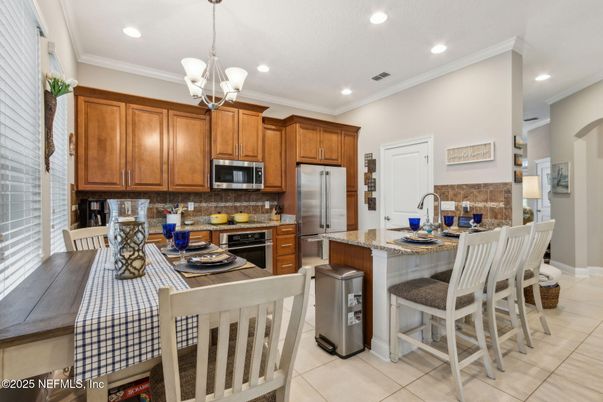 Chandelier, Dining room, Interior, Kitchen, Pendant Lights, Recessed Lighting, Stainless Steel Appliances