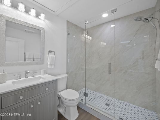 Bathroom, Glass Shower, Interior, Marble Walls, Recessed Lighting, Wood Texture Flooring