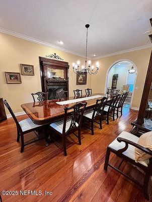 Chandelier, Dining room, Fireplace, Interior, Recessed Lighting, Wood Texture Flooring