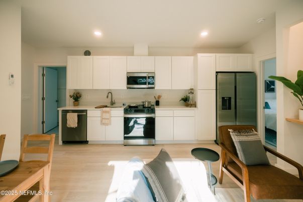 Interior, Kitchen, Recessed Lighting, Stainless Steel Appliances, Wood Texture Flooring
