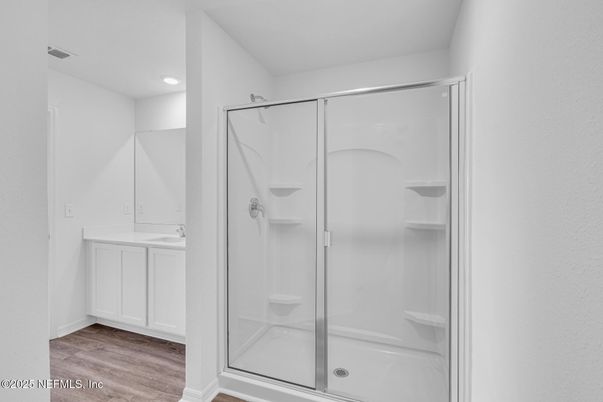 Bathroom, Glass Shower, Interior, Recessed Lighting, Wood Texture Flooring