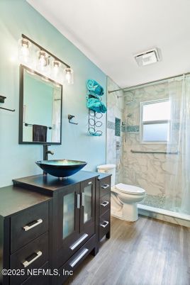 Bathroom, Glass Shower, Interior, Marble Walls, Wood Texture Flooring