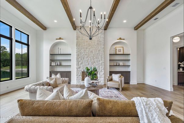 Chandelier, Fireplace, Interior, Living room, Pendant Lights, Recessed Lighting, Stone Walls, Wooden Beams, Wood Texture Flooring