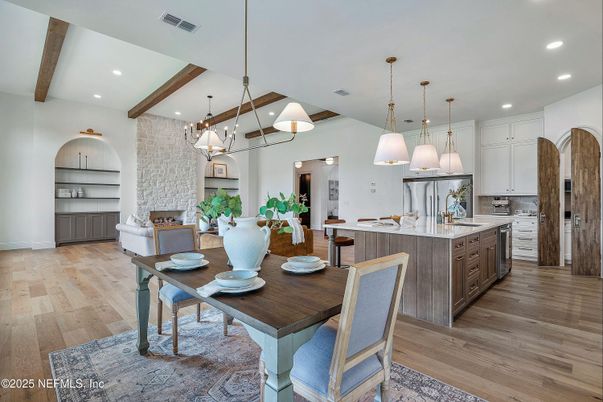Chandelier, Dining room, Interior, Kitchen, Pendant Lights, Recessed Lighting, Stainless Steel Appliances, Wooden Beams, Wood Texture Flooring