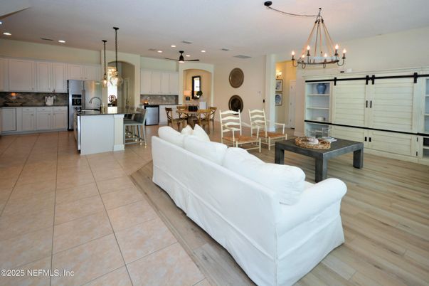 Dining room, Interior, Kitchen, Living room, Pendant Lights, Recessed Lighting, Stainless Steel Appliances, Wood Texture Flooring
