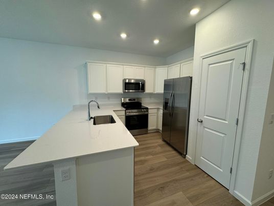 Interior, Kitchen, Recessed Lighting, Stainless Steel Appliances, Wood Texture Flooring