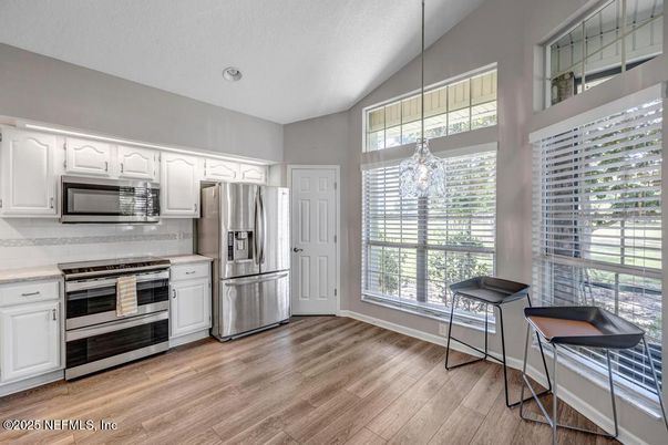 Interior, Kitchen, Pendant Lights, Recessed Lighting, Stainless Steel Appliances, Wood Texture Flooring