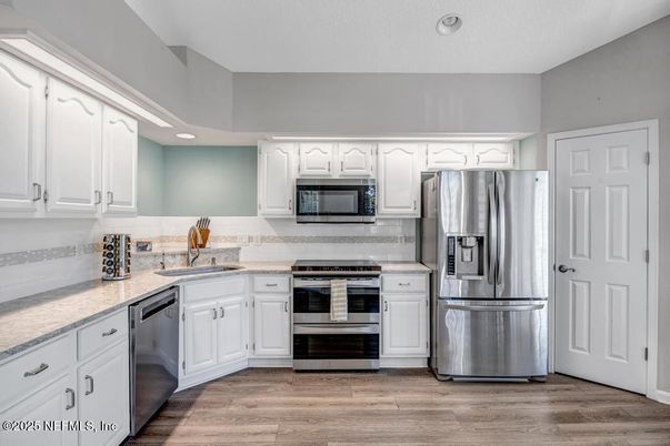 Interior, Kitchen, Recessed Lighting, Stainless Steel Appliances, Wood Texture Flooring