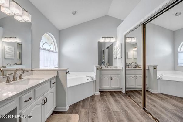 Bathroom, Dual Sink Vanities, Interior, Recessed Lighting, Wood Texture Flooring