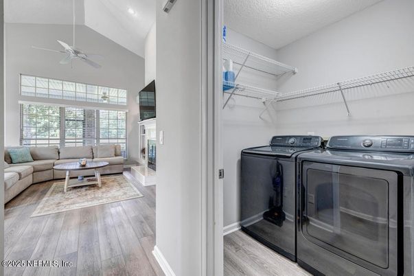 Fireplace, Interior, Living room, Recessed Lighting, Washer, Wood Texture Flooring