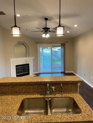 Fireplace, Interior, Pendant Lights, Recessed Lighting, Wood Texture Flooring