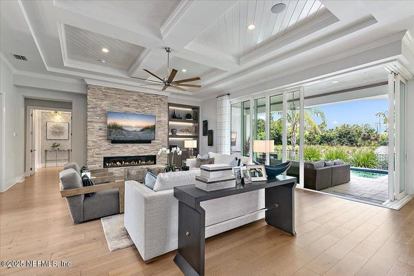 Fireplace, Interior, Living room, Recessed Lighting, Stone Walls, Wood Texture Flooring