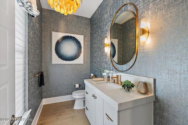 Bathroom, Chandelier, Dual Sink Vanities, Interior, Wood Texture Flooring