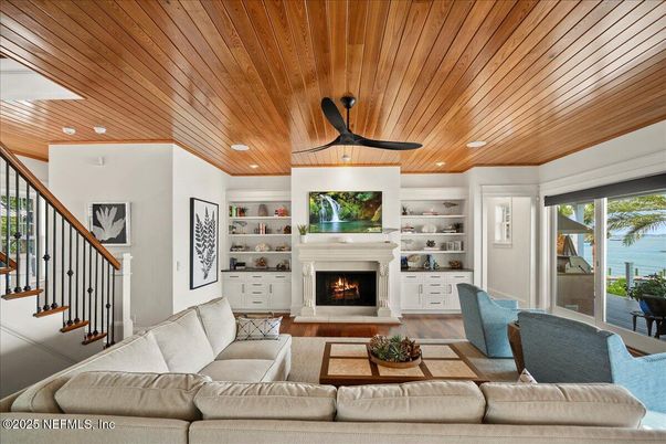 Fireplace, Interior, Living room, Recessed Lighting, Water, Wooden Ceilings, Wood Texture Flooring