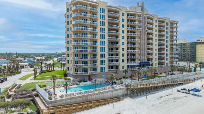 Exterior, Facade, Pool, Condo Building