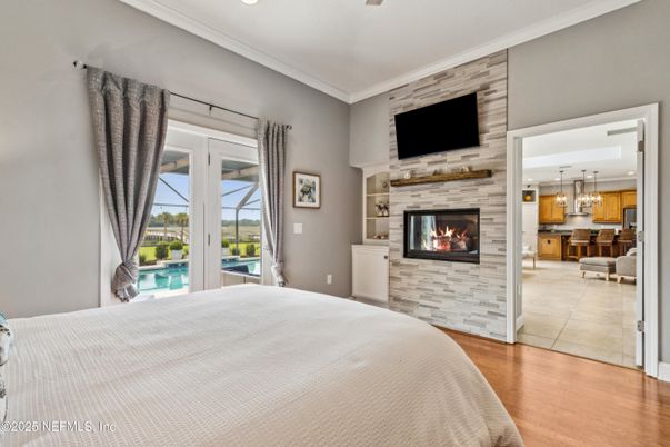 Bedroom, Fireplace, Interior, Recessed Lighting, Wood Texture Flooring