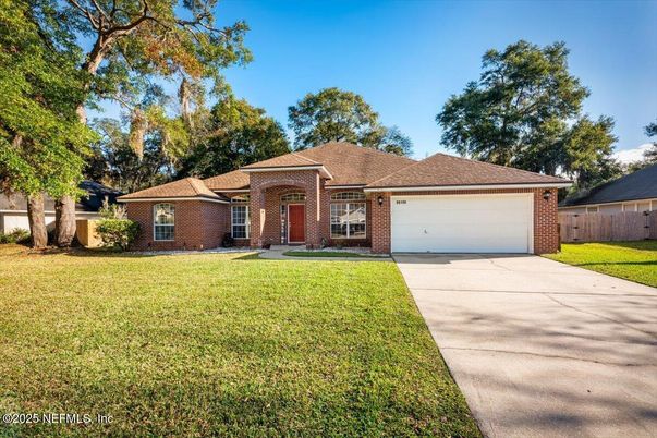 Attached, Backyard, Exterior, Facade, Brick Facade, Ranch