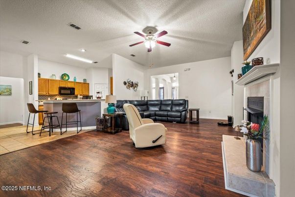 Fireplace, Interior, Kitchen, Recessed Lighting, Wood Texture Flooring