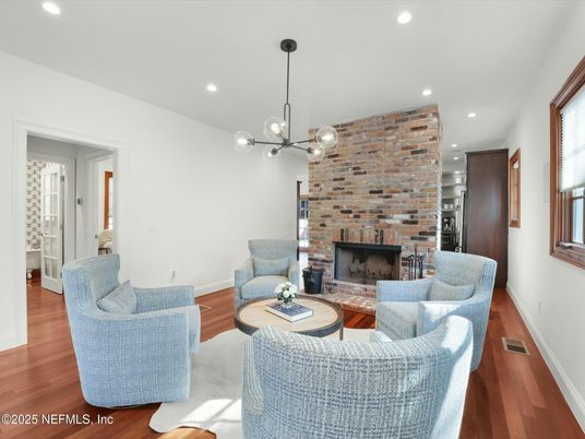 Fireplace, Interior, Living room, Pendant Lights, Recessed Lighting, Stone Walls, Wood Texture Flooring
